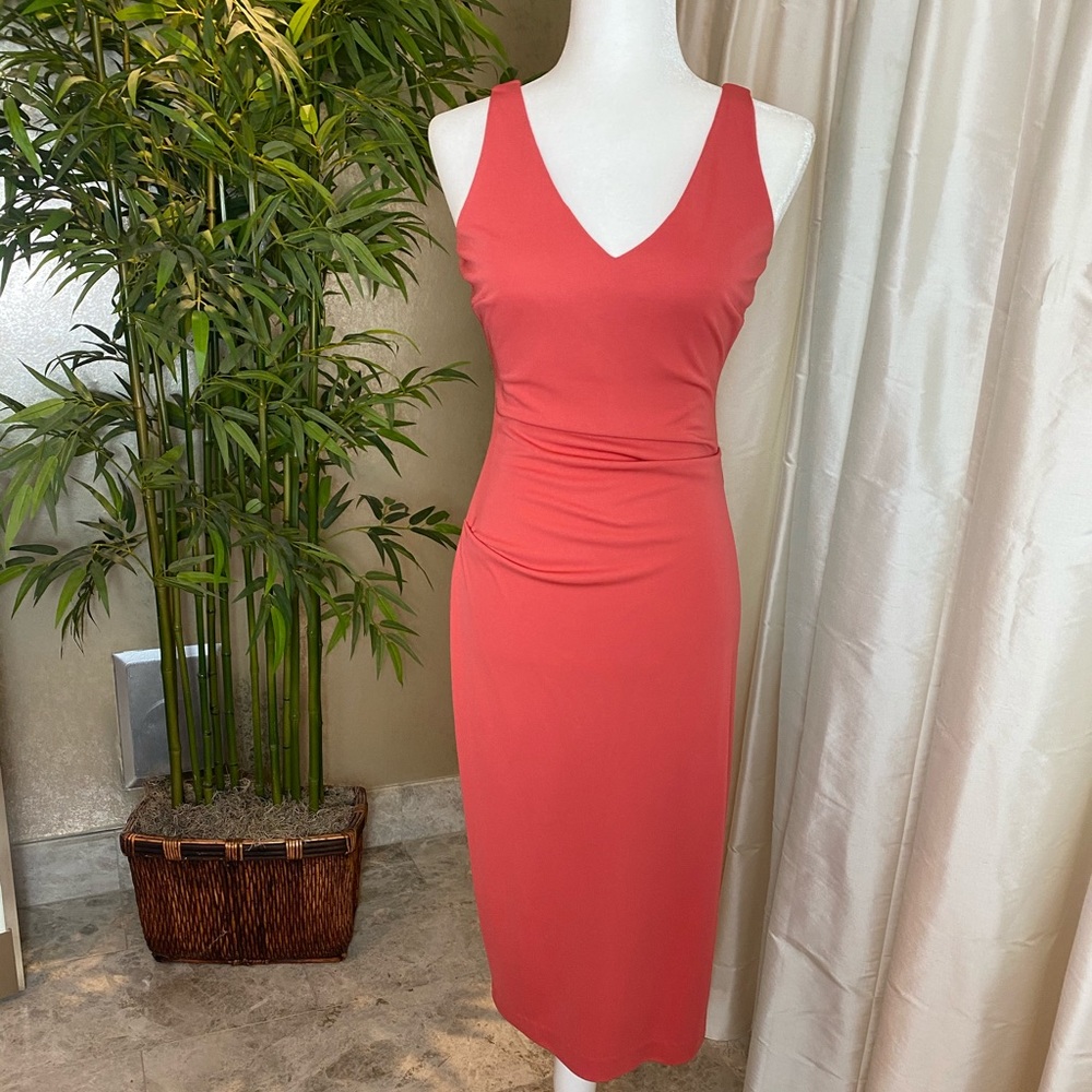 CORAL colored, flattering cocktail dress.